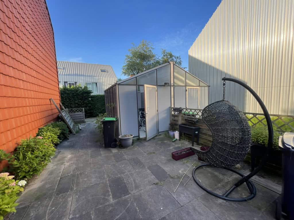Bestaande regenwateropvang in de oude tuin